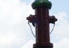 Fire hydrant with clouds in the background